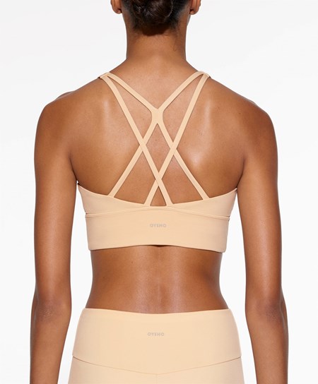 Oysho Medium-support Sports Bra With Cups Vanilla | 436975XNO